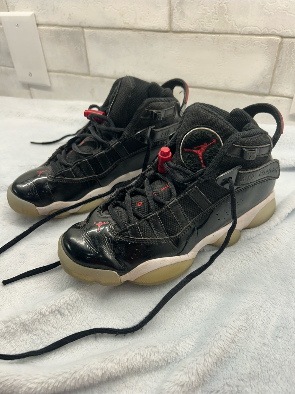 Nike Air Jordan Kids Black and Red High-Top Sneakers